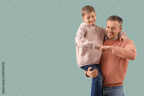 Elderly man and his little ...