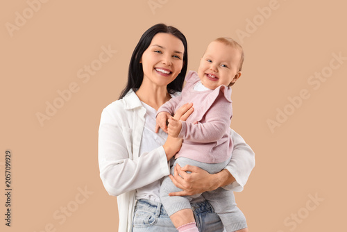 Happy young mother with her...