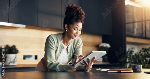 Tableau sur toile Finance, woman and happy with tablet in home for insurance payout, loyalty reward and review