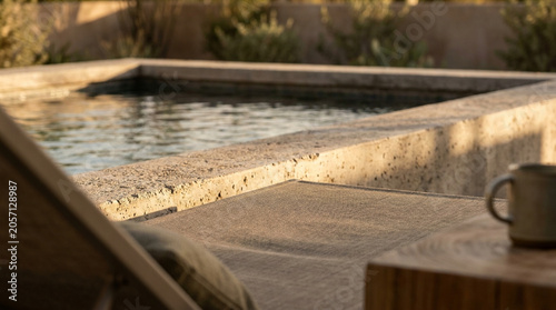 Luxury Outdoor Pool with Lounge Chair and Table