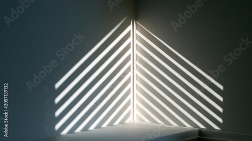Light casts sharp diagonal stripes across a dark corner