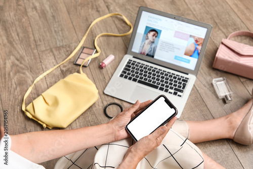 Woman using smartphone and ...