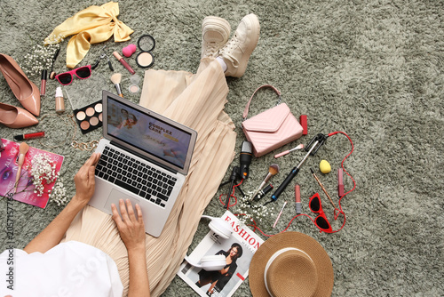 Woman using laptop for beau...
