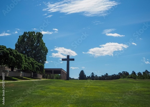 Photography Skogskyrkogården memorial cross and chapel landscape on a sunny summer day in St