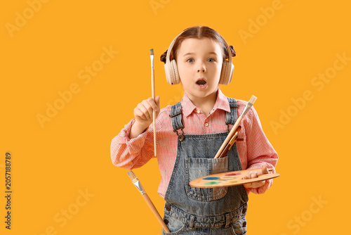 Surprised little girl artis...