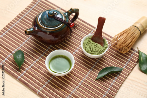 Bowls of matcha powder and ...
