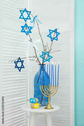 Stool with menorah, dreidel...