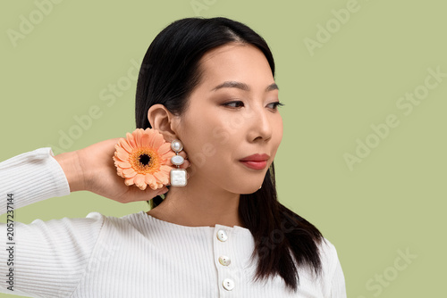 Young Asian woman with beau...