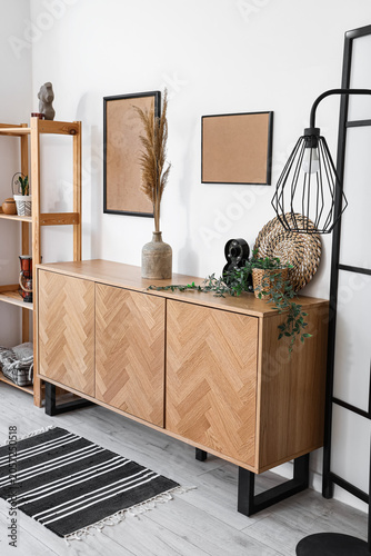 Wooden sideboard with pampa...