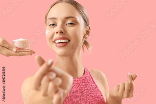 Pretty young woman and hand...
