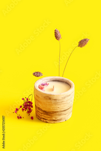 Holder with candle and flow...