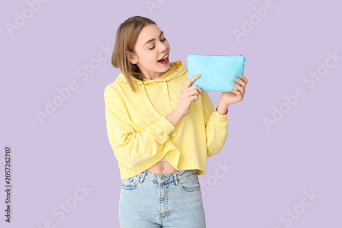 Young woman with cosmetic b...