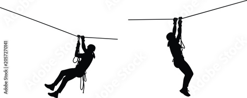 Vászonkép Black silhouette of active people riding a zipline extreme adventure sport isola