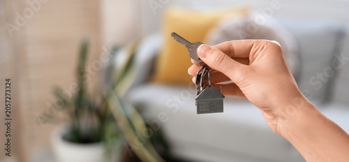 Female hand with key from f...