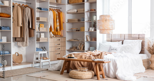 Interior of light bedroom w...