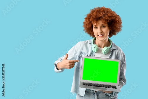 Smiling young woman with cu...