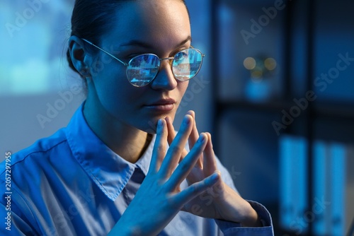 Focused woman analyzing dat...