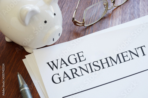 Foto Wage Garnishment Concept Showing Court Ordered Payroll Deductions, Debt Collecti
