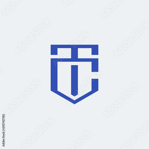 TC monogram logo in shield shape