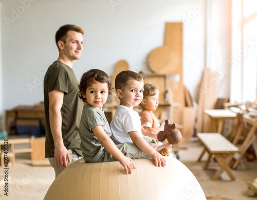 Happy family playing together at home indoors.