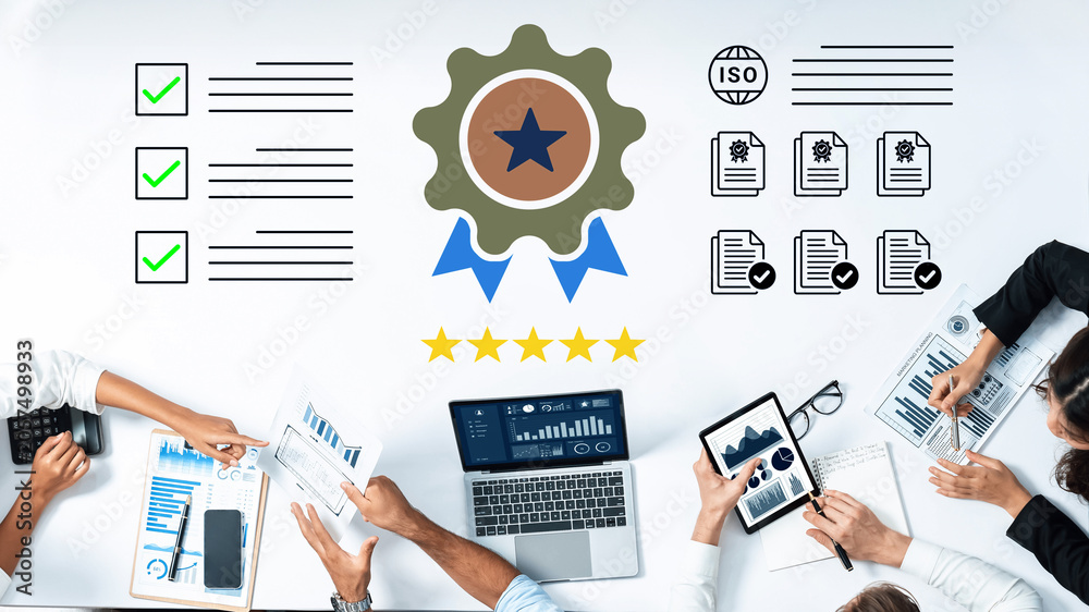 Fototapeta premium Diverse professionals collaborate on quality management, showcasing ISO certification, charts, and checklists in a modern office setup, emphasizing teamwork and efficiency. Cyphers