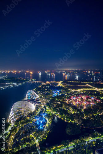 Aerial night view of Singapore waterfront gardens and bay