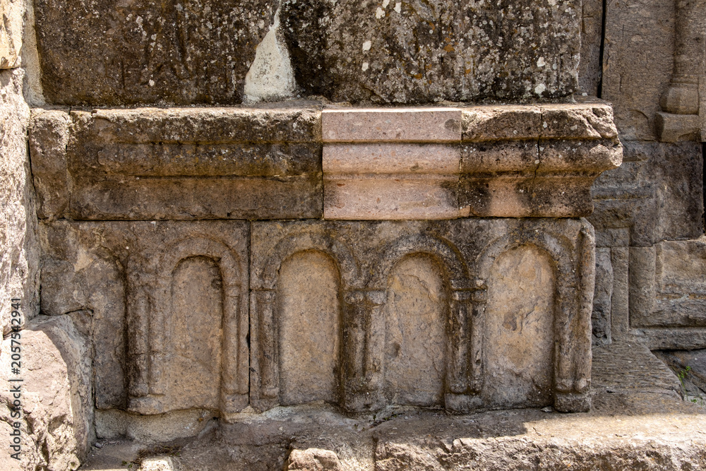 Fototapeta premium Close-up of intricate medieval architectural decoration on Haghartsyn Monastery in Tavush region, Armenia