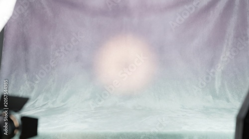 Dreamy gradient background with soft glowing light in a photo studio setup