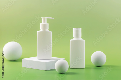 white cosmetic bottles suggesting natural skincare and organic beauty products