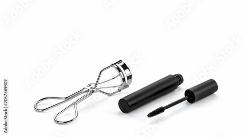 metal eyelash curler and black mascara wand on white studio surface