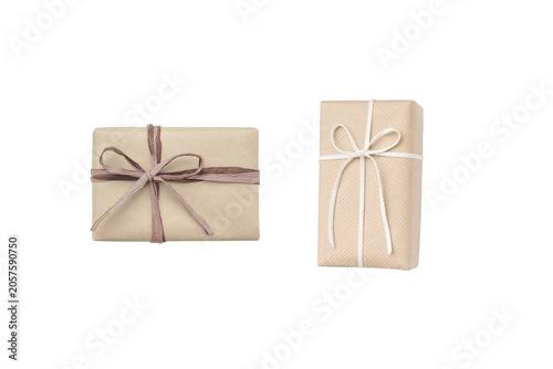Two gift boxes: a sand-colored gift box with a soothing brown ribbon and a sand-colored gift box with a white ribbon	