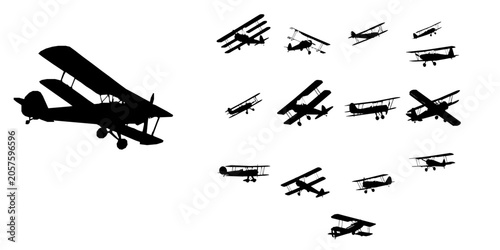 Vintage Biplane in Flight Silhouette