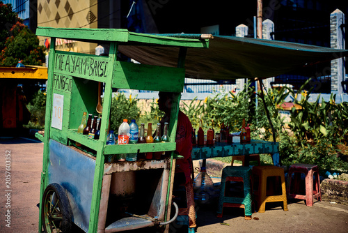 A street vendor waiting for customers