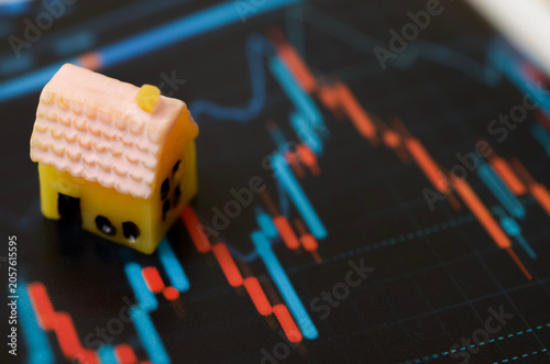 Property market online trading and financial investment analysis on electronic screen
