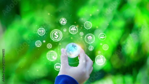 Women holding world and icon to Organization Sustainable development environmental. business responsible environmental,	

