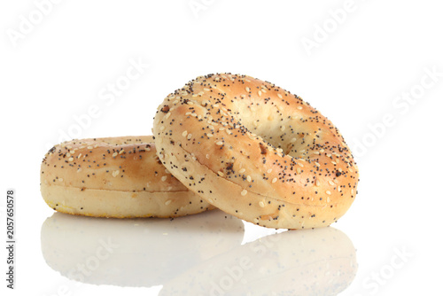 closeup of two everything seasoned bagels