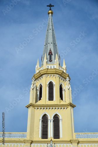 Bangkok, Thailand – May 14, 2026: Gothic Revival spire and bell tower of Holy Rosary Church (Kalawar Church) against a dramatic sky in Bangkok