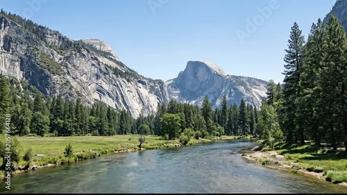 Exploring a Serene Mountain Valley River Scene in Bright Daylight