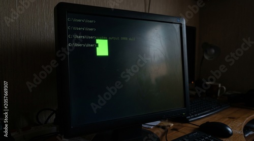 Dark Room Computer Screen with Green Highlighted Folder