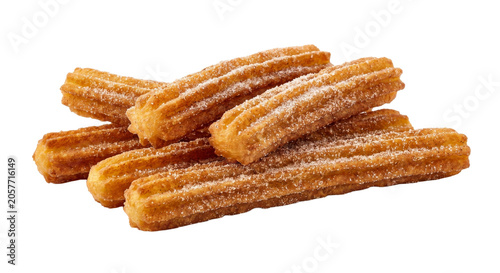 Foto Pile of golden brown churros dusted with sugar and cinnamon on a white backgroun
