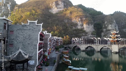 Riverside architecture and stone bridge in Zhenyuan Ancient Town, Guizhou, China