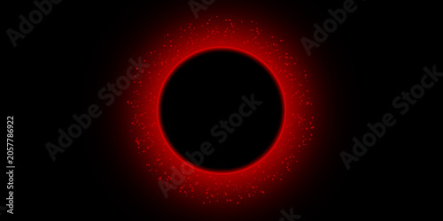Photos Glowing red neon circle with abstract red particles exploding outwards on black background
