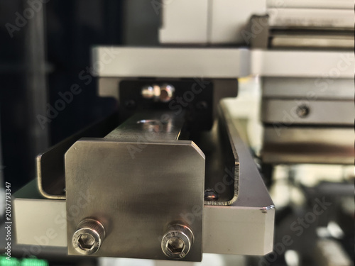 Metal rail bearing guide industrial machine component