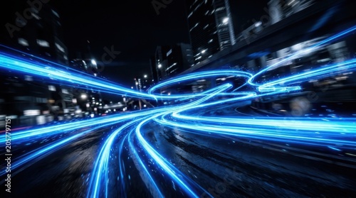 Glowing blue light trails on city street at night