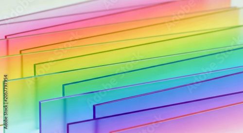 Abstract background of colorful translucent acrylic glass sheets arranged in a diagonal pattern