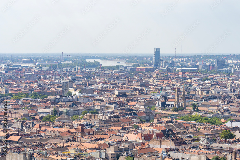 Obraz premium Panoramic cityscape of Budapest from the air with residential buildings and green areas