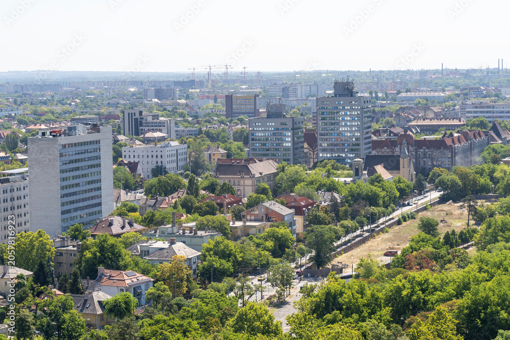Obraz premium Panoramic cityscape of Budapest from the air with residential buildings and green areas