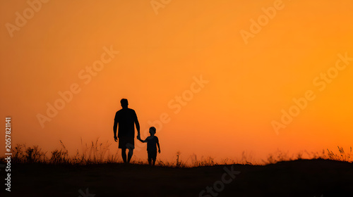 father and child silhouette at sunset, holding hands, golden hour lighting, emotional father's day background, copy space 