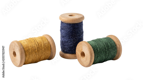 Sewing thread spools for fashion, tailoring, handmade products and craft projects. Isolated on White background.