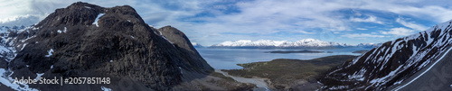 Panoramic  drone shot in the Lyngen Alps with the village of Koppangen in Norway